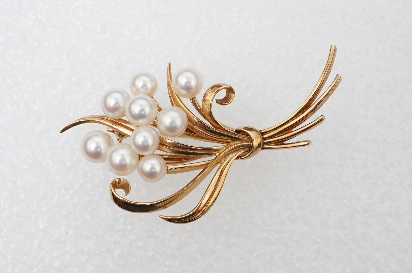 Mikimoto, a cultured pearl brooch